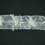 Rifinitura in organza con motivo in rilievo avorio 3cm