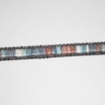 Guarnizione termoadesiva con strass e centrale in tessuto 1cm