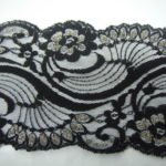 Pizzo sintetico nero con lurex oro 9cm