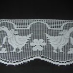 Merletto in cotone fantasia oche bianco 11cm